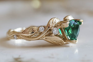 Gold branch ring with leaves, trillion cut engagement ring