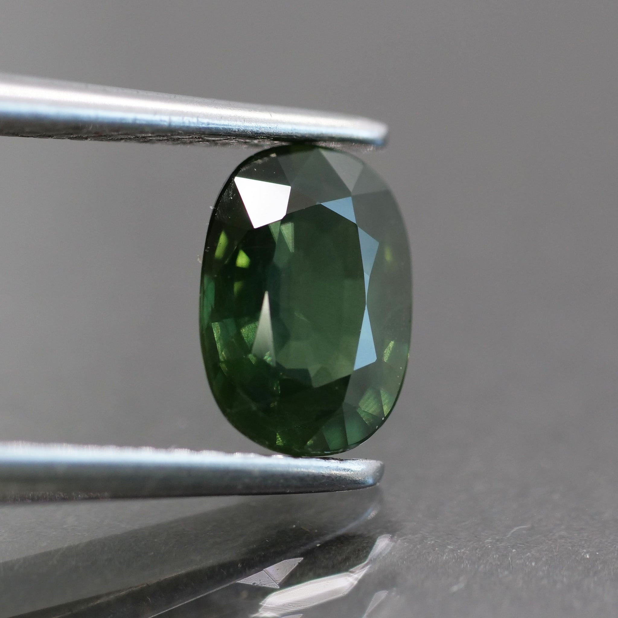 Sapphire | natural, deep green, oval cut 7x5 mm, VS, 1 ct, Madagascar - Eden Garden Jewelry™