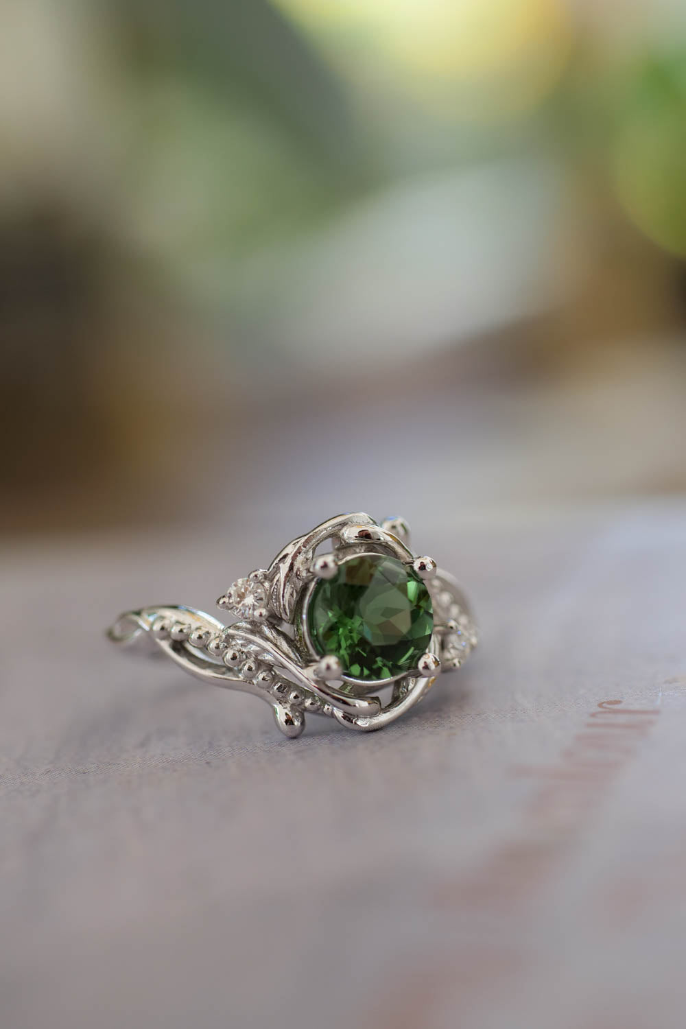 green tourmaline engagement ring