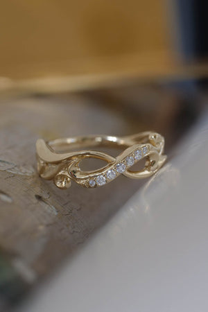 Infinity wedding band with diamonds