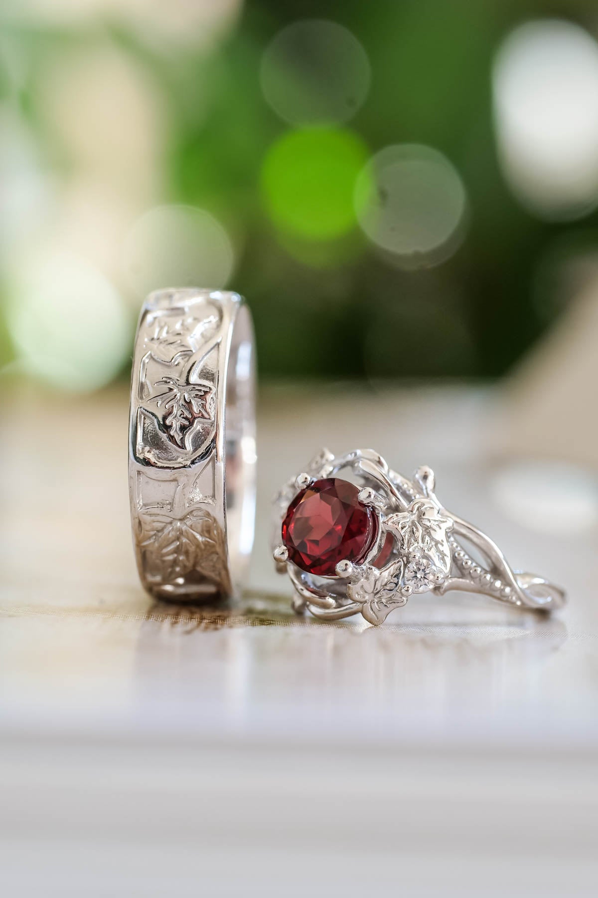 Wedding rings set for couples: gold ivy leaves band for him, gold ivy leaves ring with garnet for her - Eden Garden Jewelry™