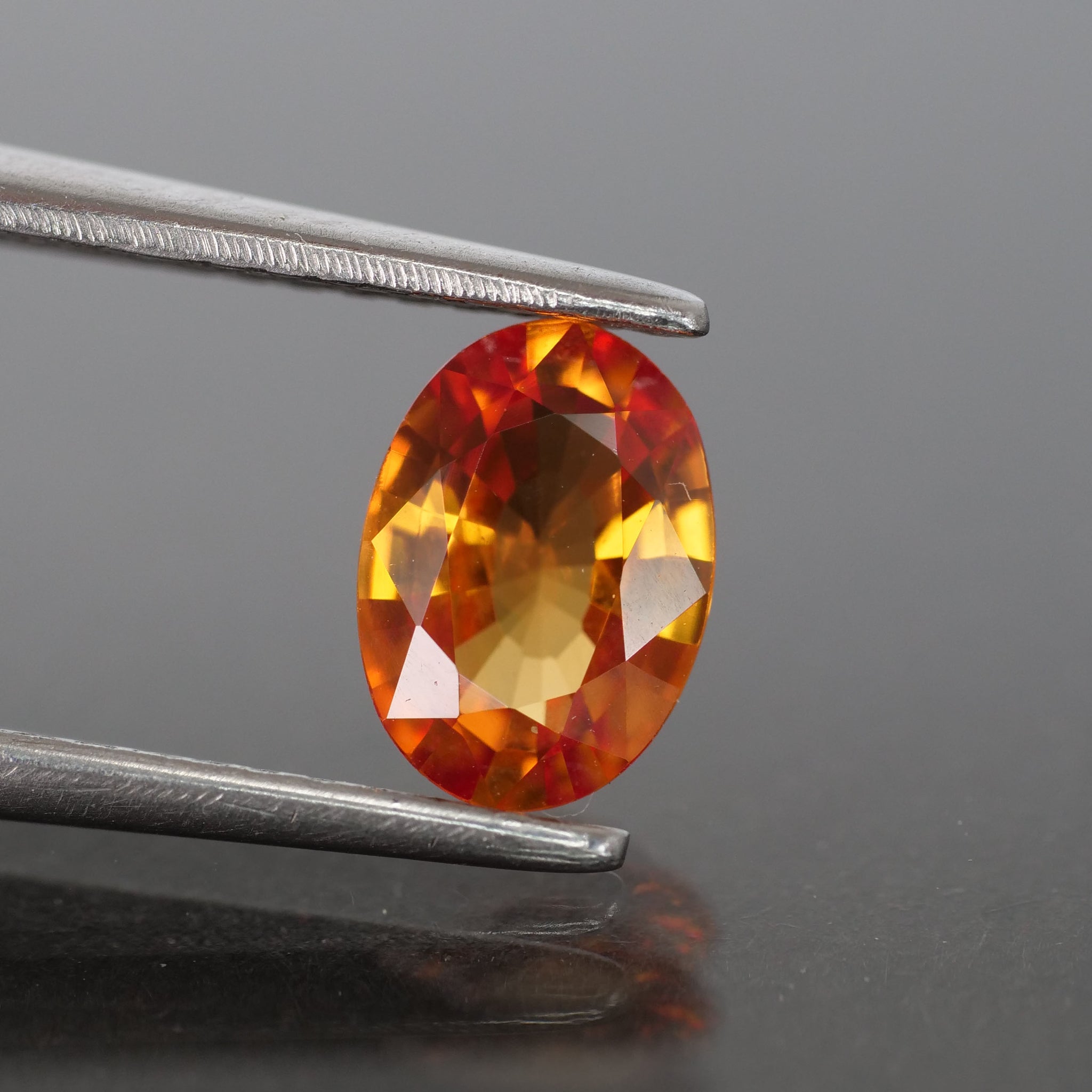 Sapphire | natural, orange, oval cut 7x5 mm, 0.87ct, Songea, Tanzania - Eden Garden Jewelry™